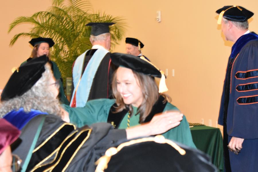 Student Receives Doctoral Cord