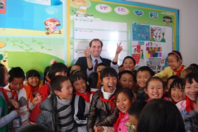 Chris Gareis, Associate Dean for Teacher Education and Professional Services, visiting a Grade 4 classroom in Kunming, China.  The teacher described him as the first Westerner that the children had seen in person.