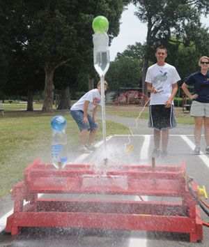 Students demonstrate a rocket launch during the 2010 Dahlgren Summer Academy.  Photo Credit: Karen Hogue