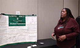 Kirstin Byrd presents her dissertation research during the poster session.