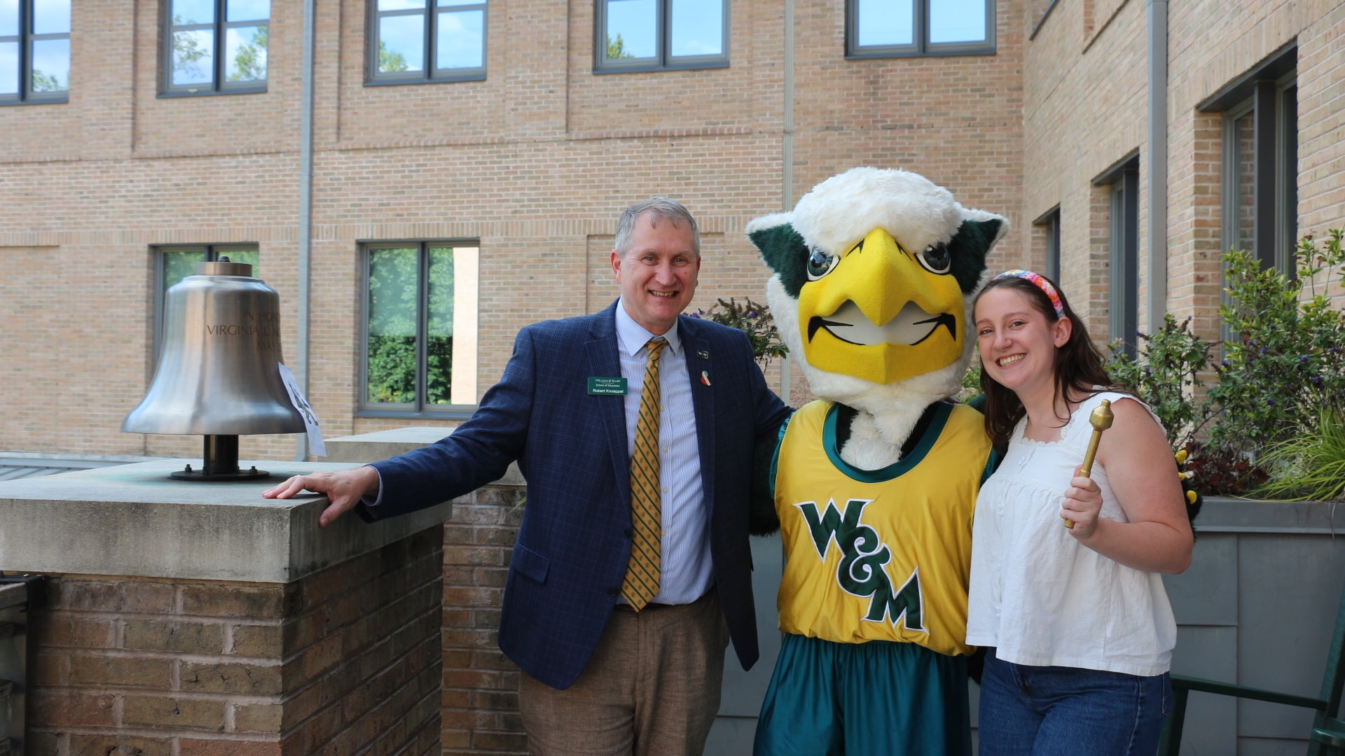 Griffin with Dean and Student Ringing Bell