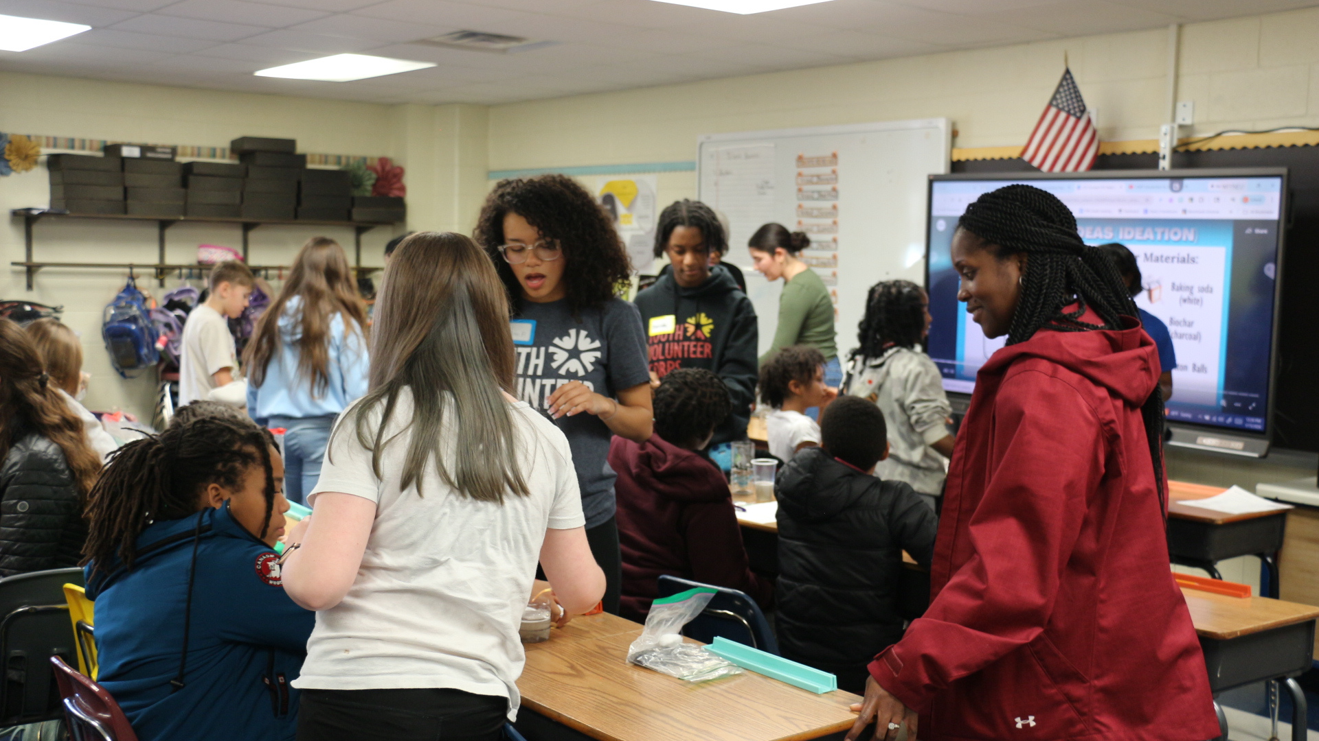 High School Youth Volunteer coaching students