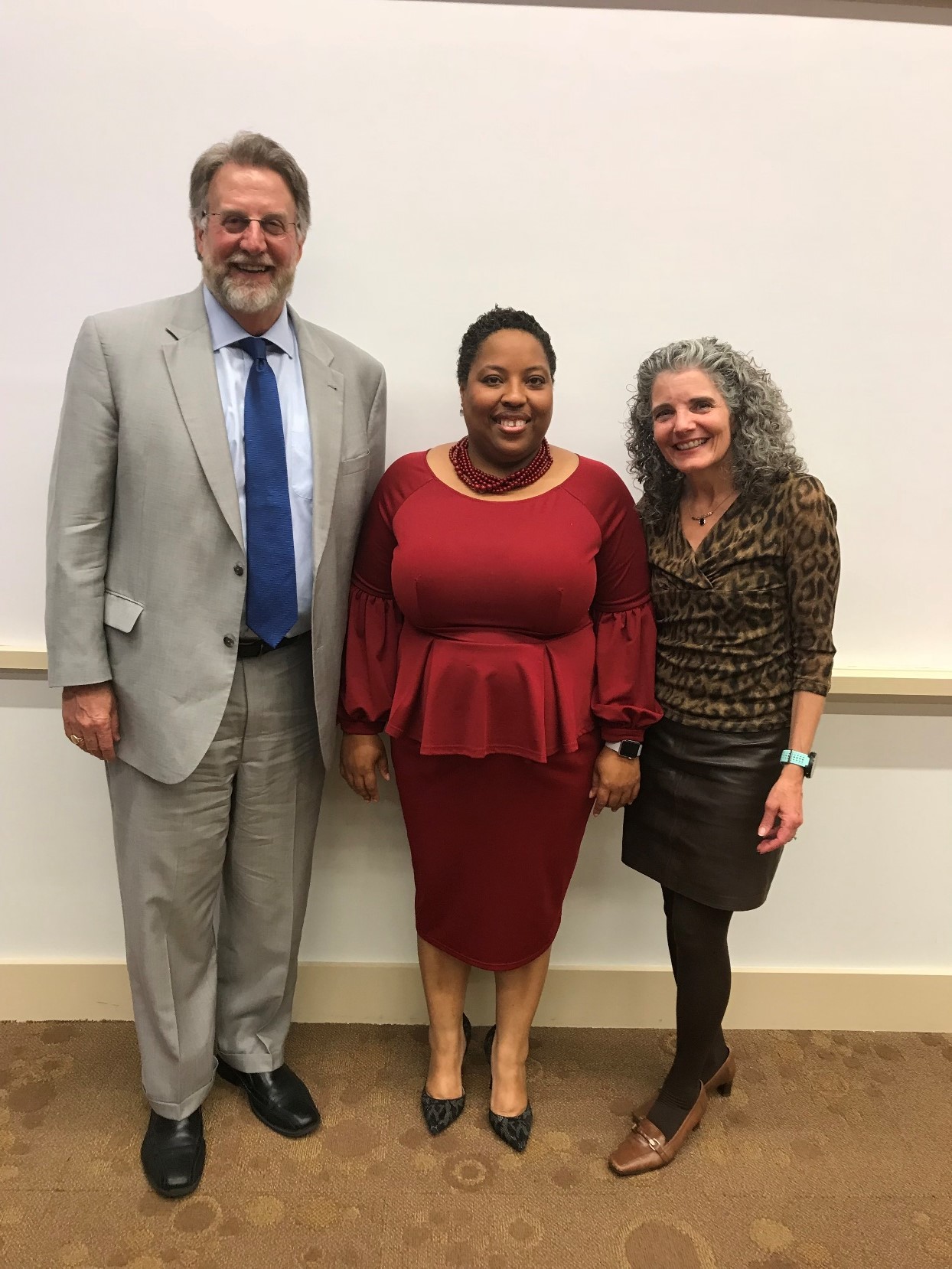 Lacrecia Cade, JD ‘02 (center) with Dean Niles (left) and Dr. Pamela Eddy (right).