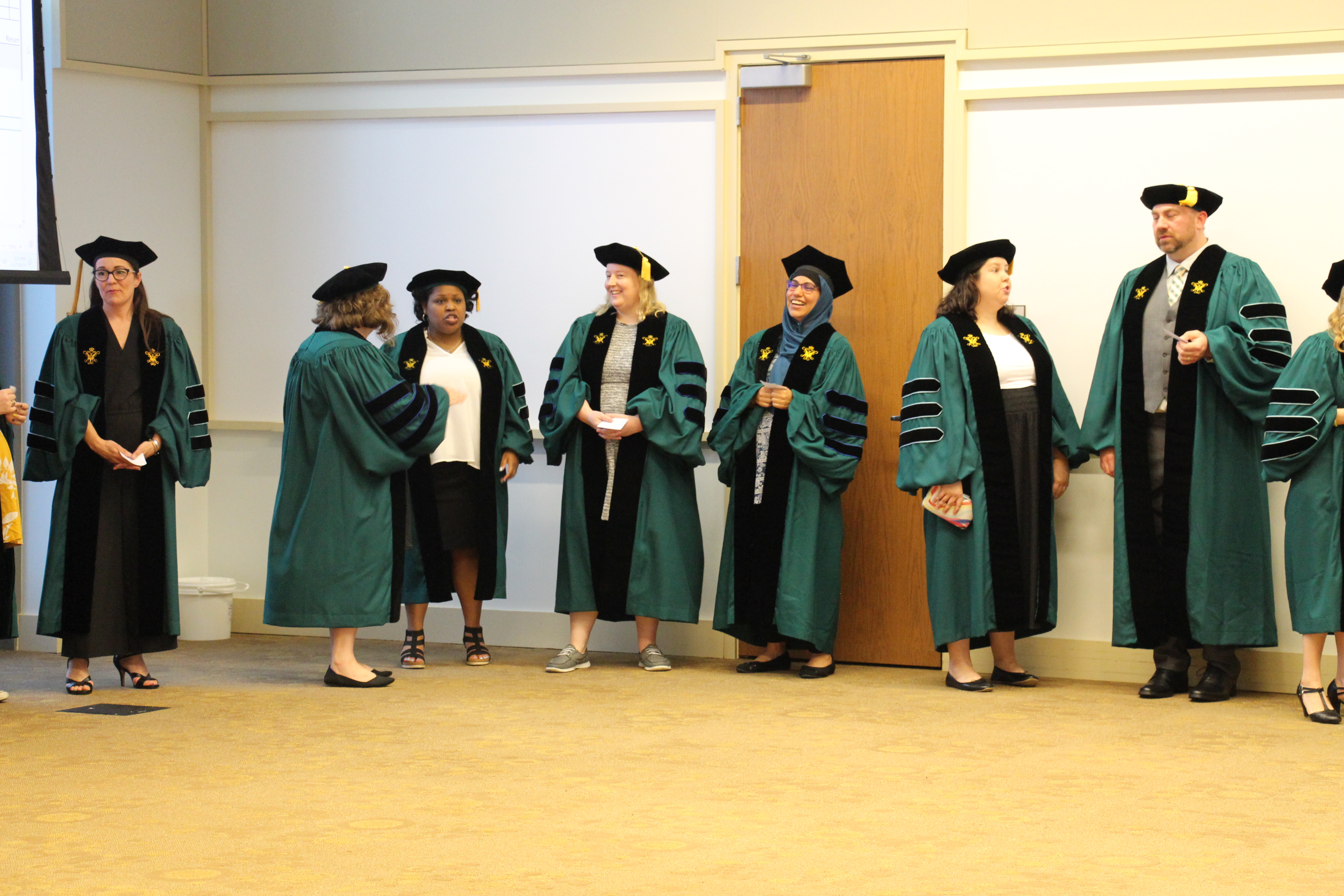 Graduates Line Up For Processional