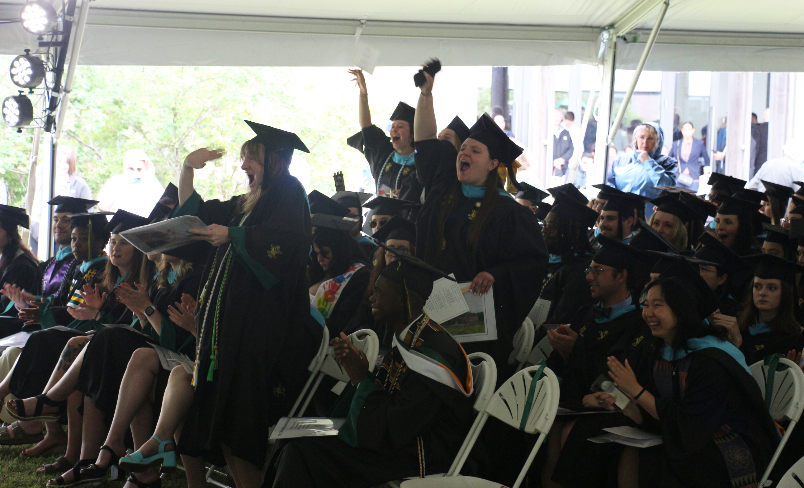 Graduates Cheering During the Ceremony