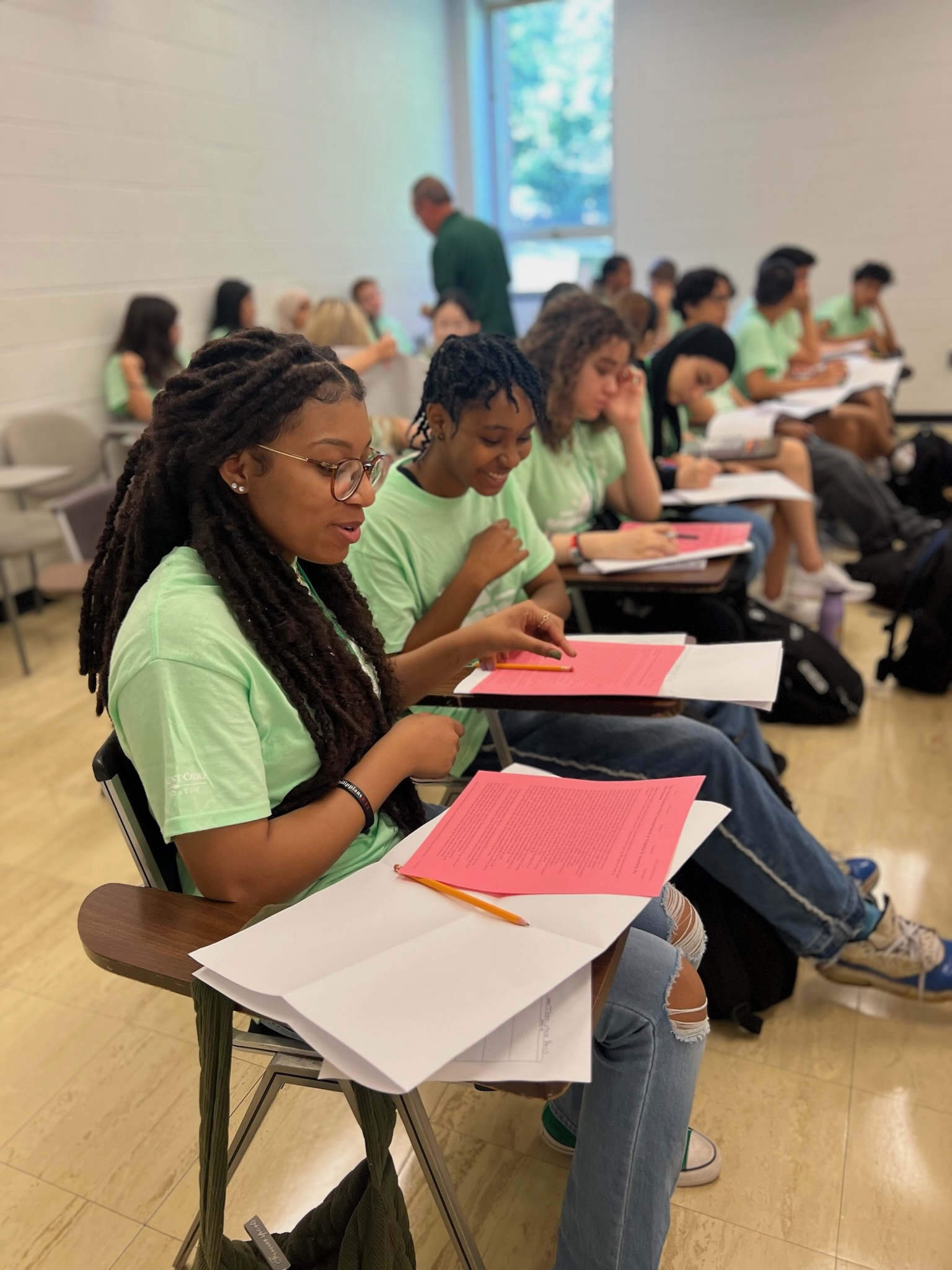 The Optimist Project students working together on an assignment.