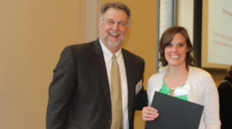 Dean Spencer Niles presents the Pruden scholarship award to Giovanna DiPasquale .