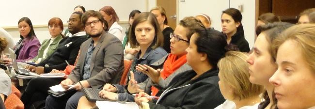 Higher education doctoral student Rachel McDonald asking Dr. Kanter a question