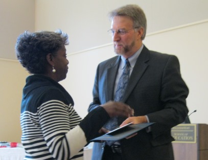 Mary Jackson receives the Staff Award from Dean Niles