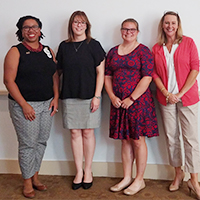 Asia Randolph, Tracey Schneider, Erin Wojtkun, and Sarah Hylton, following the presentations.