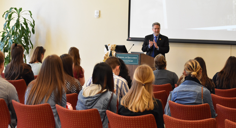 Spencer Niles talks to students during a day for admitted students.