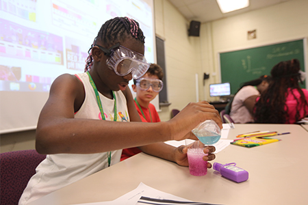Students work on an experiment at Camp Launch in 2016.
