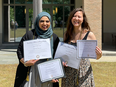 Stephanie Dorais Ph.D. '21 (right), winner of the doctoral Award for Excellence, poses with Leila Warraich Ph.D. '21, winner of the Thatcher Award.  