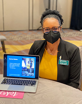 Denise Lewis Ph.D. '23 presents her proposed dissertation research during the roundtable.