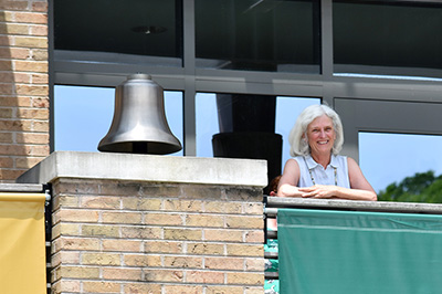 Virginia McLaughlin '71 rang the school bell to close the commencement ceremony.