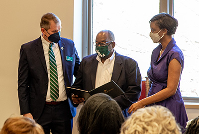 Hulon Willis, Jr. '77 (center) poses with Dean Rob Knoeppel and Professor Stephanie Blackmon. {em}Photo by Skip Rowland '83{/em}