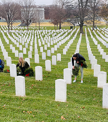Students and faculty lay wreaths at Arlington National Cemetery