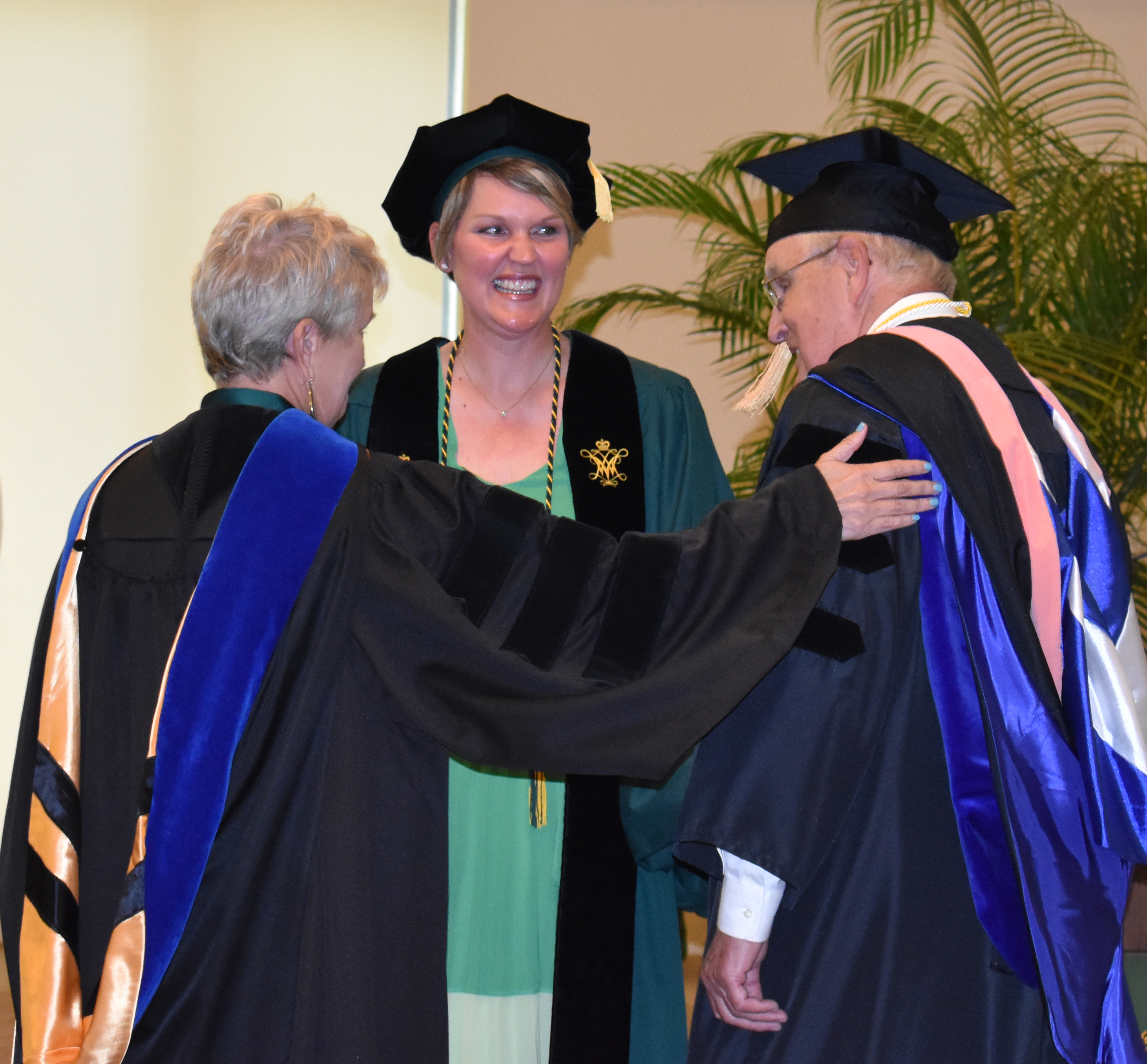 Kathryn Kryscio Ph.D. '23 with her dad and Margaret Constantino