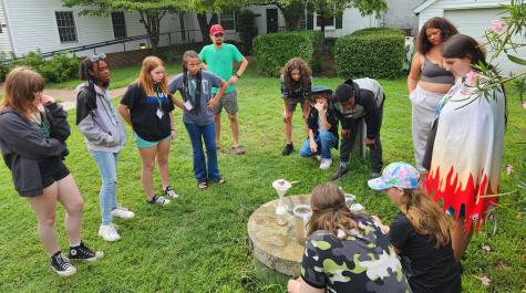 Camp Orbit students working on an outdoor project.