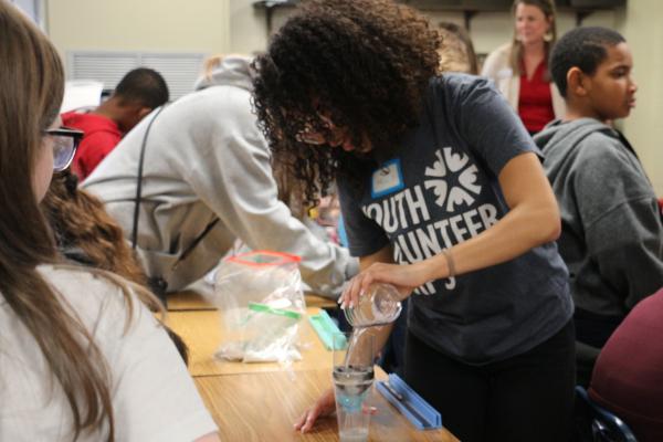 Youth Volunteer Corps of Hampton Roads (YVCHR) student coaches fifth-grader