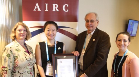 Jingzhu Zhang receives award at the AIRC conference