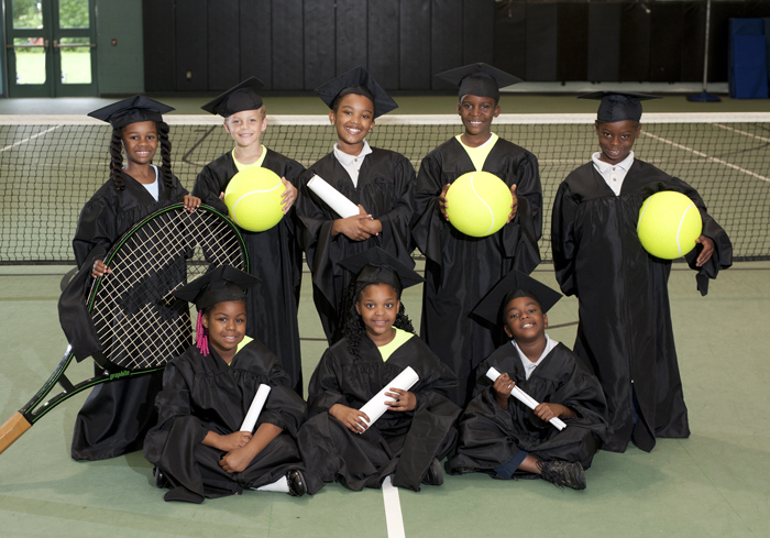 Students participating in An Achievable Dream's tennis program. An Achievable Dream started as an after-school tennis camp but has expanded to encompass several local schools.